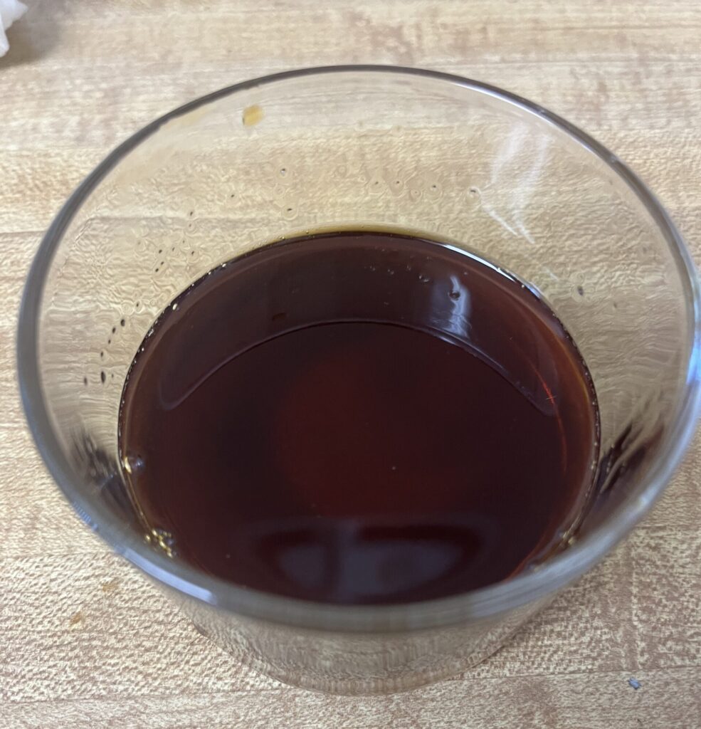 Mixing soy sauce, maple syrup, and rice vinegar