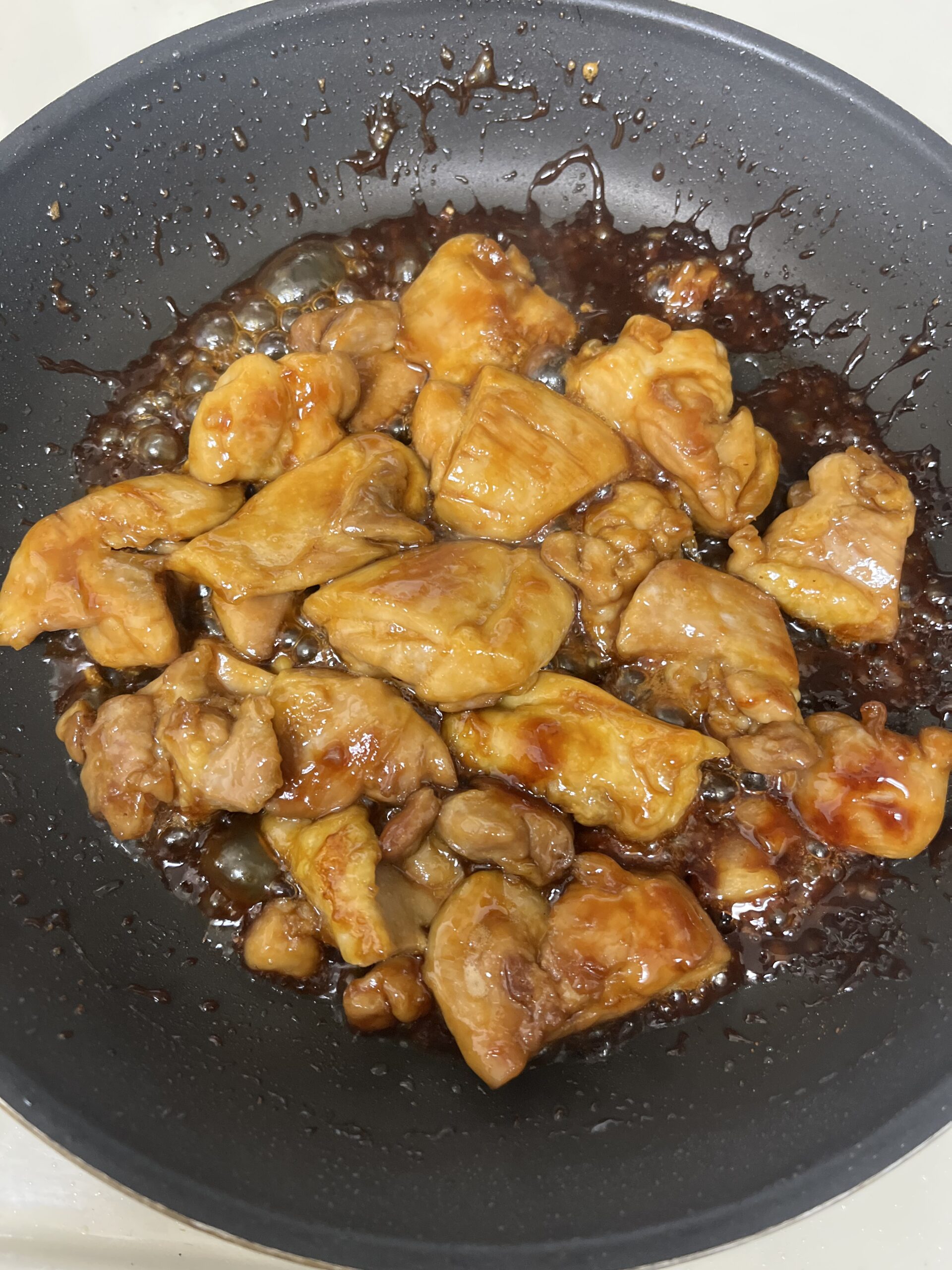 Simmering chicken in teriyaki sauce-2