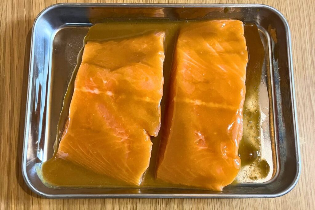 Brushing miso glaze on skinless salmon fillets before cooking – Trader Joe’s ingredients