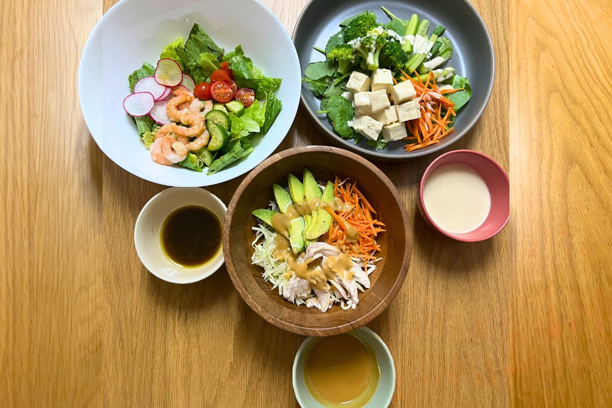 Three Japanese-style dressings with salad bowls made using Trader Joe’s ingredients