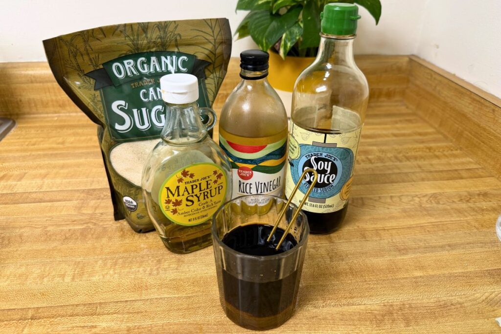Mixing teriyaki sauce with soy sauce, maple syrup, rice vinegar, and sugar