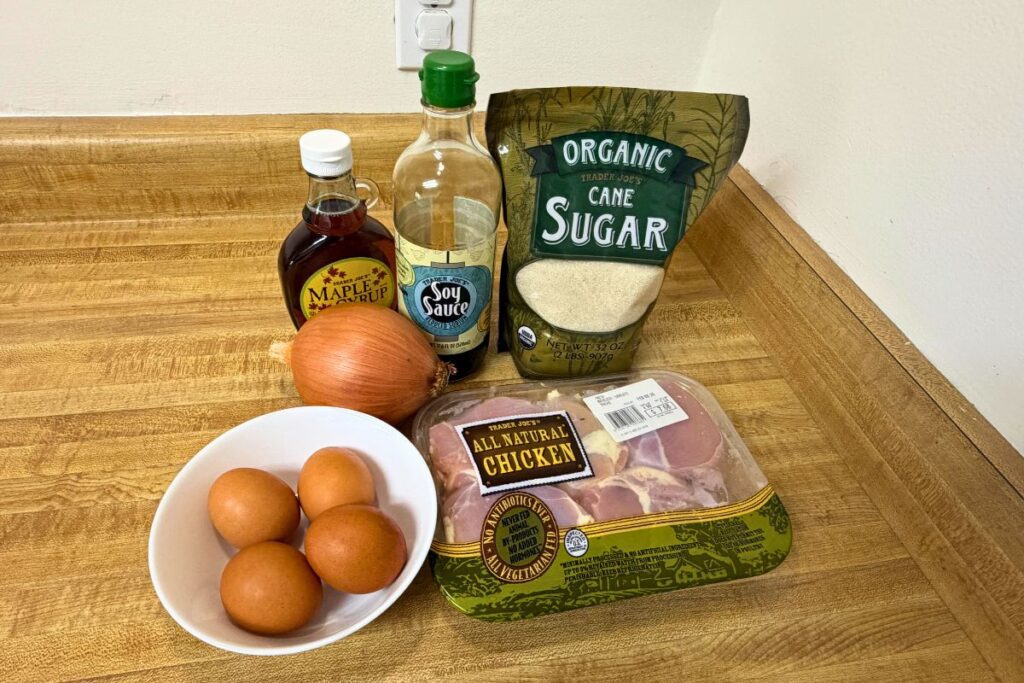 Ingredients for easy oyakodon using Trader Joe’s chicken thighs, eggs, onion, and seasonings